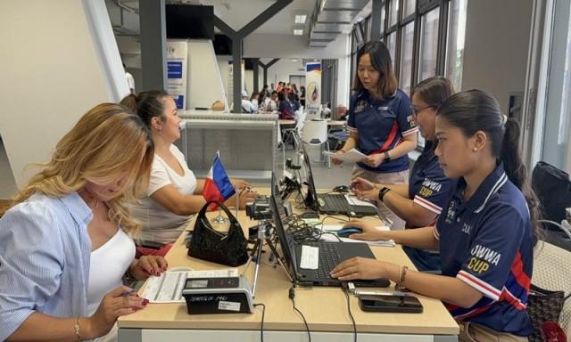 Philippine Embassy staff also organized a voter's registration desk for attending Filipinos. Photo: Andy Peñafuerte III