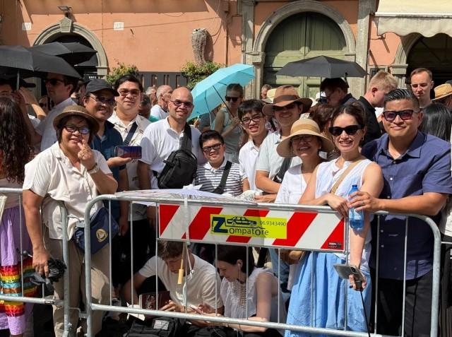 Filipino pilgrims—including (from left to right) Leonora Balindua; Guangzhou-based teachers Edmer Alcaraz and Ryan Riconalla; the Perez family; and Donna and Angel Tabancay—just met and became acquaintances during the Pope's Angelus prayer on July 26. Photo: Andy Peñafuerte III