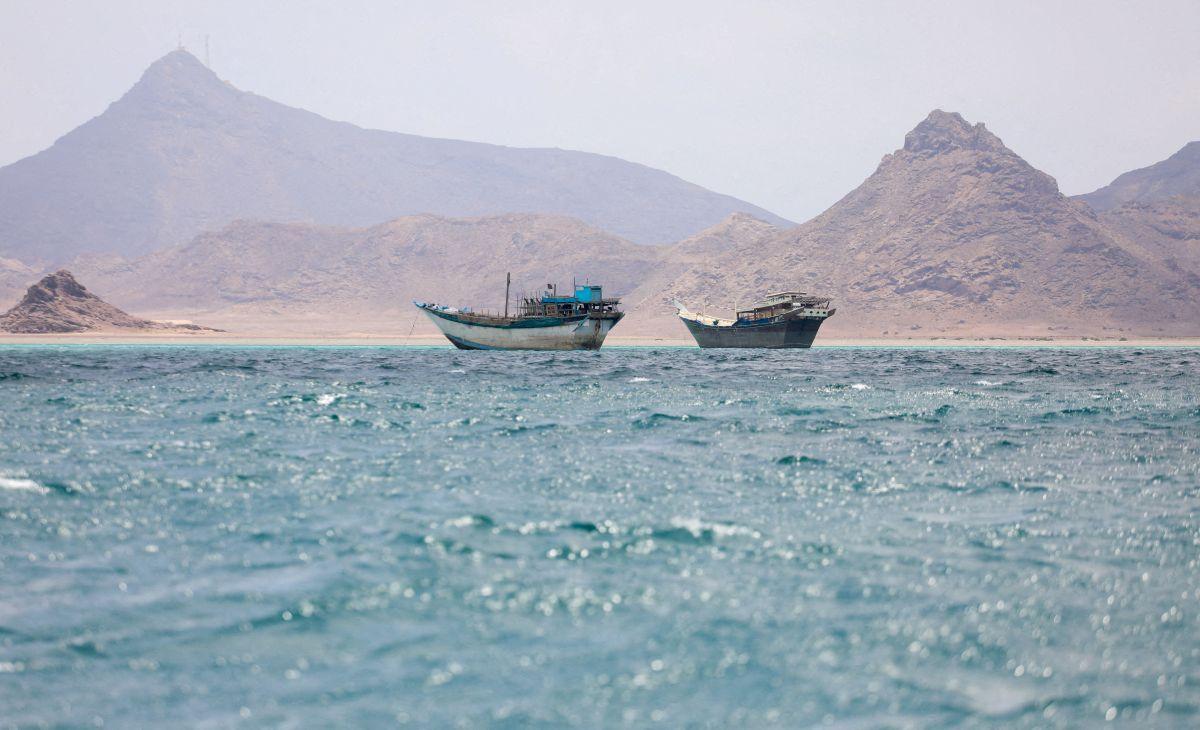 Boats float near the coast of Bab el-Mandeb Strait, Yemen