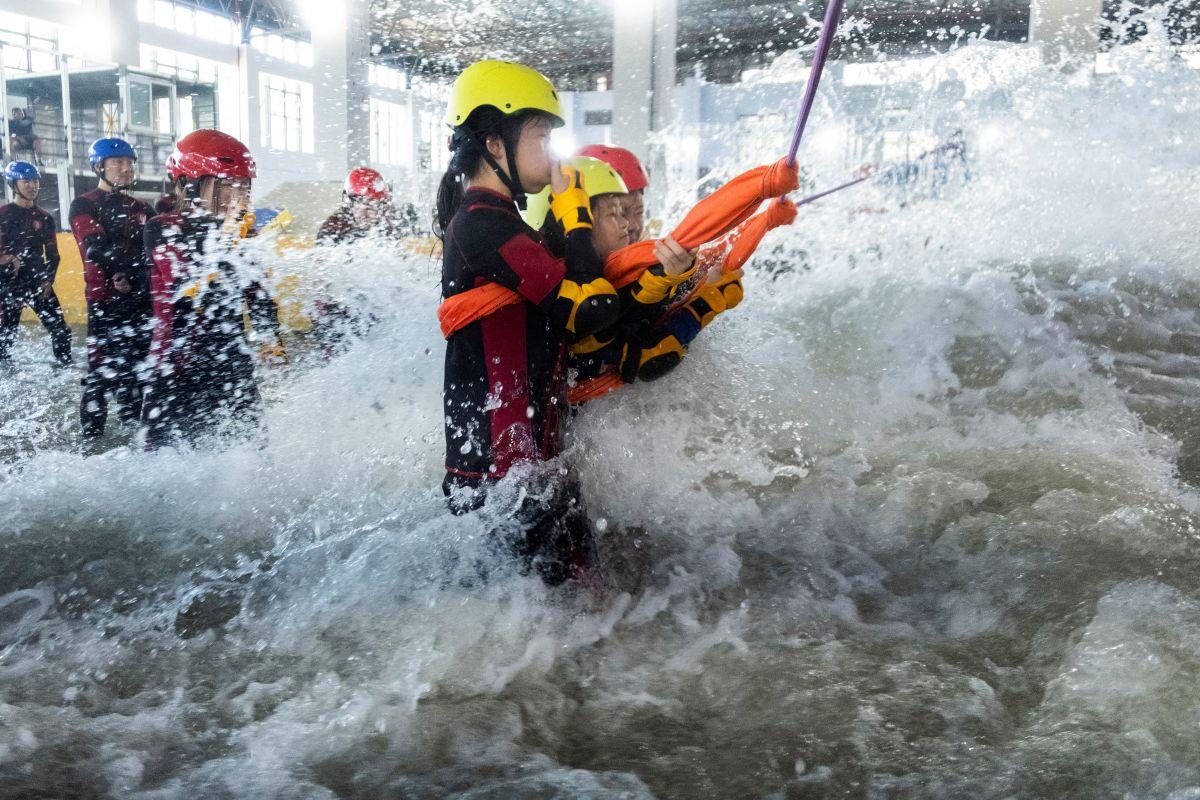 In China, people brave simulated typhoons to prepare for the real thing
