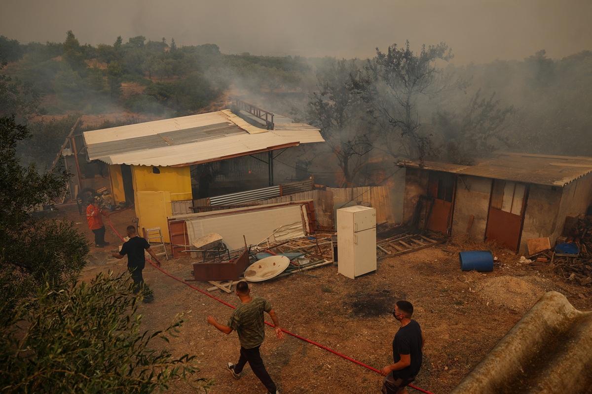 Two helicopters collide as Greece battles wildfires, Hungary shuts nuclear plant