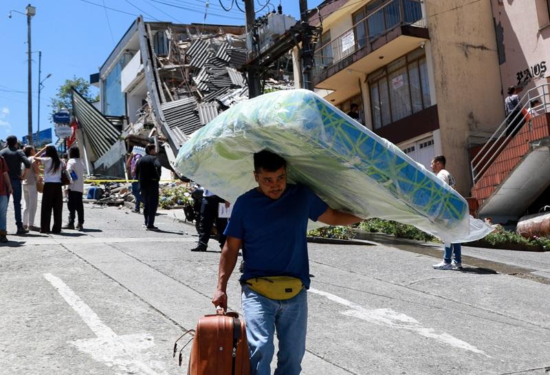 At least 111 killed after powerful earthquake hits western Colombia
