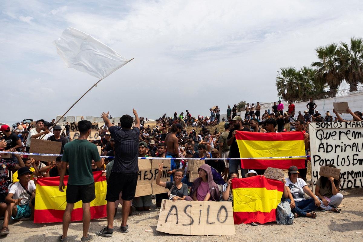 In Spain's Ceuta, hundreds of migrants stage protest and demand asylum