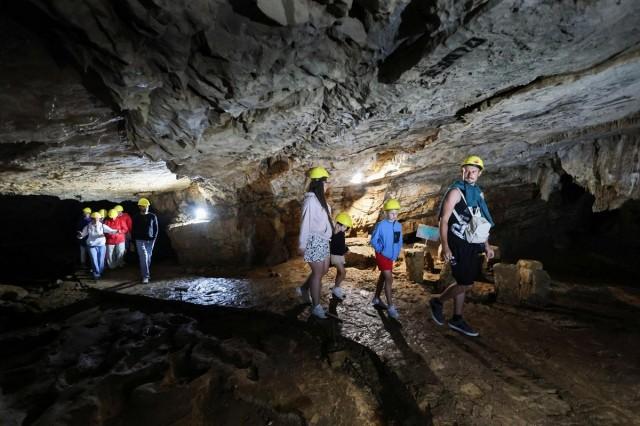 Tourists visit Vjetrenica Cave, a UNESCO World Heritage Site, where temperatures remain a constant 11 degrees Celsius (52 degrees Fahrenheit), to escape the summer heat as the Balkans endure repeated heatwaves, in Ravno, Bosnia and Herzegovina, July 31, 2026. REUTERS/ Amel Emric