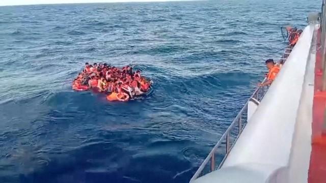 Passengers rescued from the KM Putri Yasmin ferry that caught fire in waters off Lombok, float in the sea during a rescue operation, in Indonesia, August 12, 2026, in this screengrab taken from a handout video. Basarnas/ Handout via REUTERS