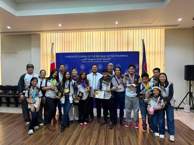 Members of Team UAE are warmly received by Consul General Ambrosio Brian Enciso III (center, in barong), head of the Philippine mission in Dubai and the Northern Emirates. Courtesy: Elipas C. Sibua