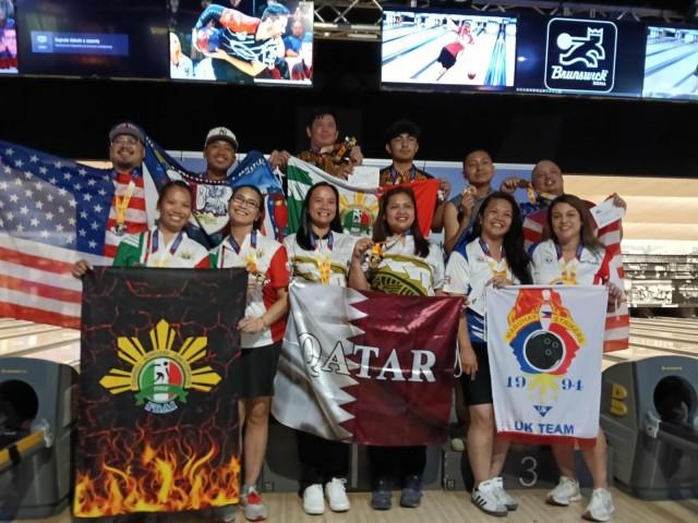 The winners of the men's and women's doubles event of the 11th World Overseas Filipino Bowling Tour (WOFBT) 2026 in Rome. PIA GONZALEZ ABUCAY