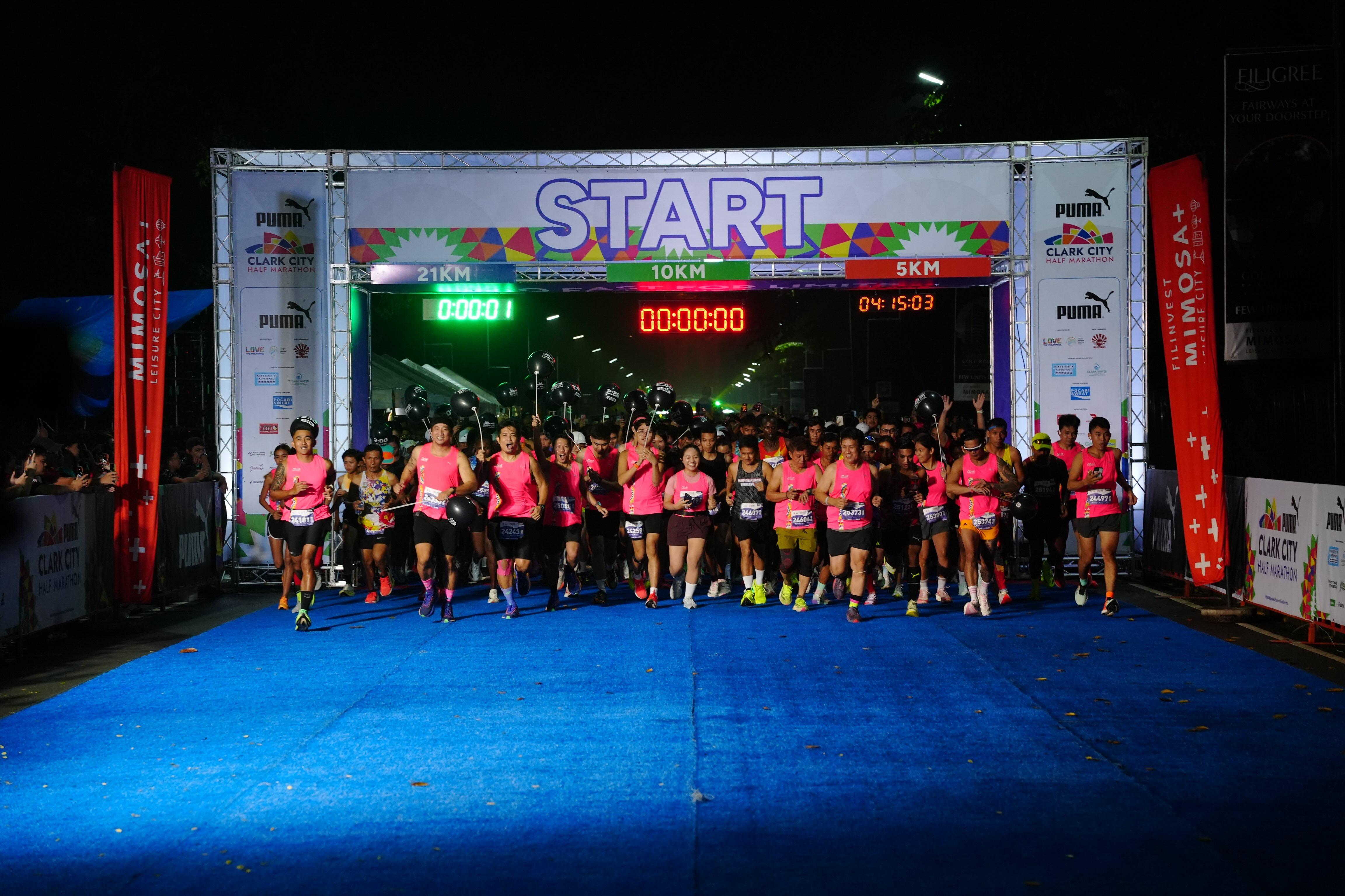 Elite runners Muge, Magtubo top Clark Half Marathon