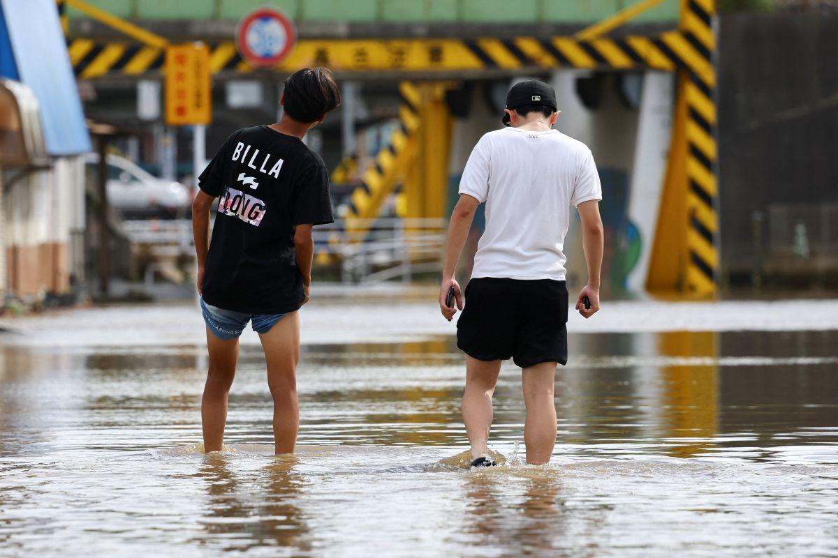 Japan's record rains strand thousands at Narita airport; kill eight