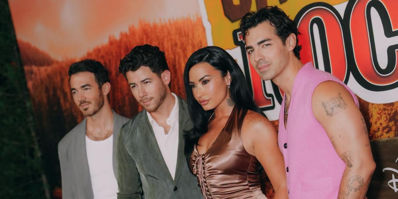 Demi Lovato, Jonas Brothers reunite at 'Camp Rock 3' red carpet premiere 