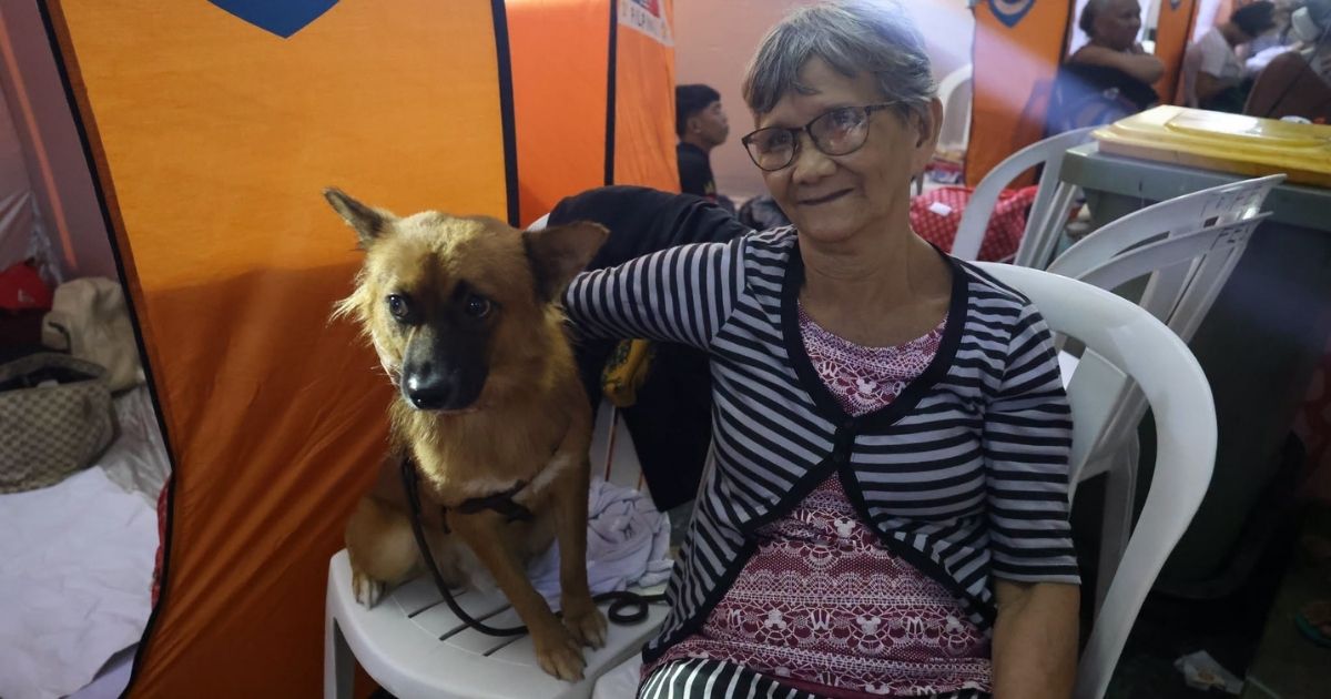 QC residents bring pets with them to evacuation center amid heavy rains, flooding