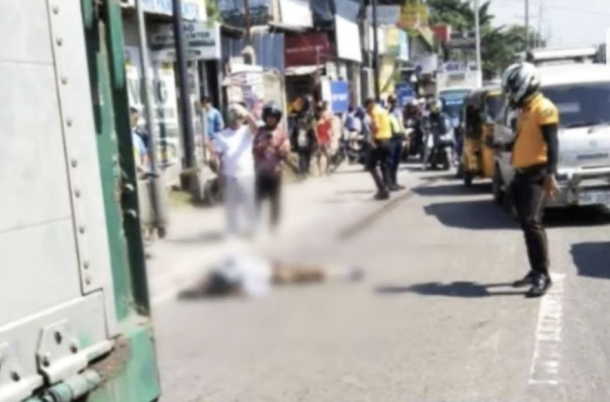 Motorcycle passenger dies after being run over by truck 