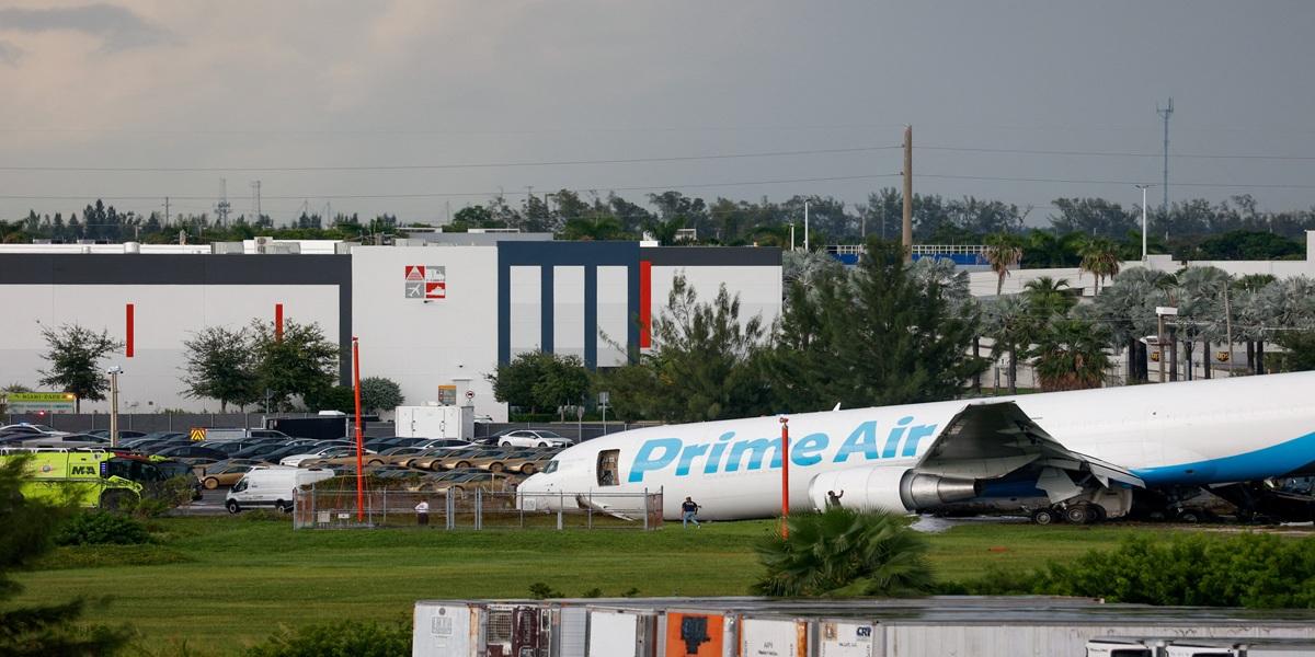 Amazon cargo plane overshoots Miami runway, hits vehicles, catches fire