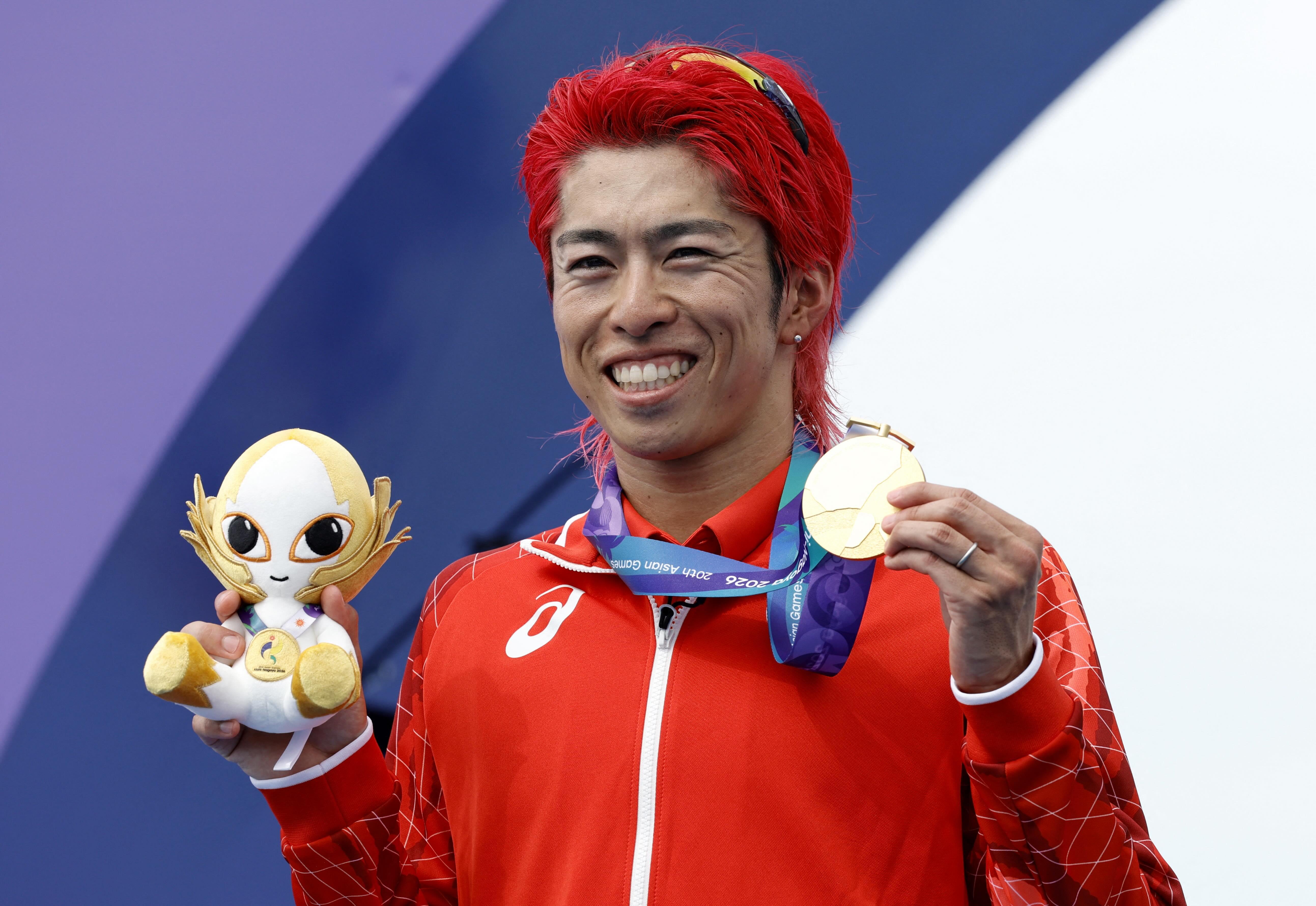 Japan wins first gold of home Asian Games in men's individual triathlon - GMA Network