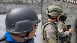 Reporting a two-hour firefight behind a concrete wall&nbsp;