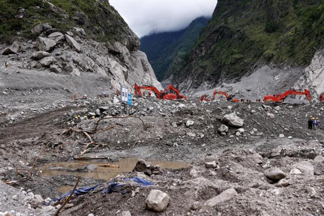 Rescue workers conduct search and rescue operations at the core disaster-hit area at Gyirong Port following the August 26 mudslide, during an organized media tour in Shigatse, Tibet Autonomous Region, China September 6, 2026. REUTERS/ Tingshu Wang/ Pool