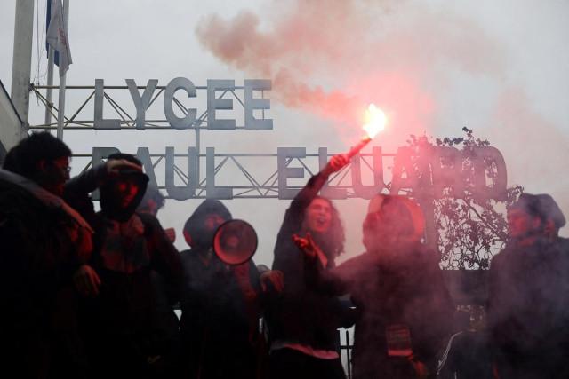 French high school students block the access to the Lycee Paul Eluard high school as they protest to demand the hiring of substitute teachers, increased resources and better learning conditions, in Saint-Denis, near Paris, France, September 30, 2026. REUTERS/ Abdul Saboor