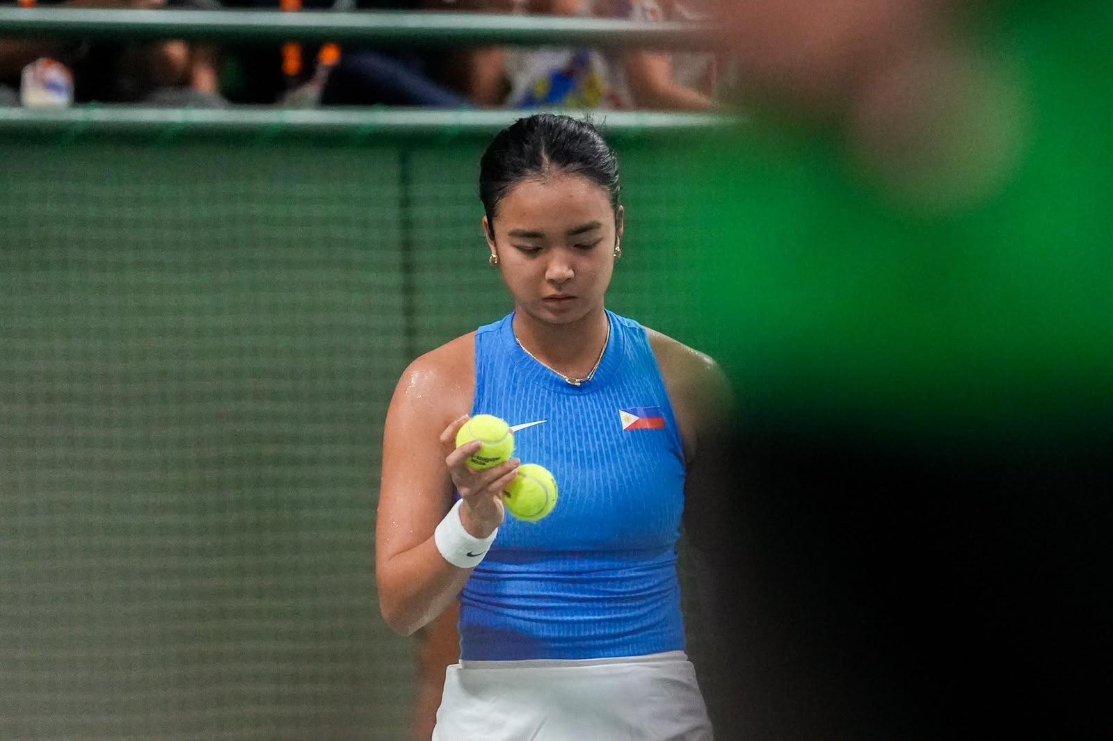 Alex Eala shrugs off weather conditions, possible WTA fine as she chases Asian Games gold - GMA Network