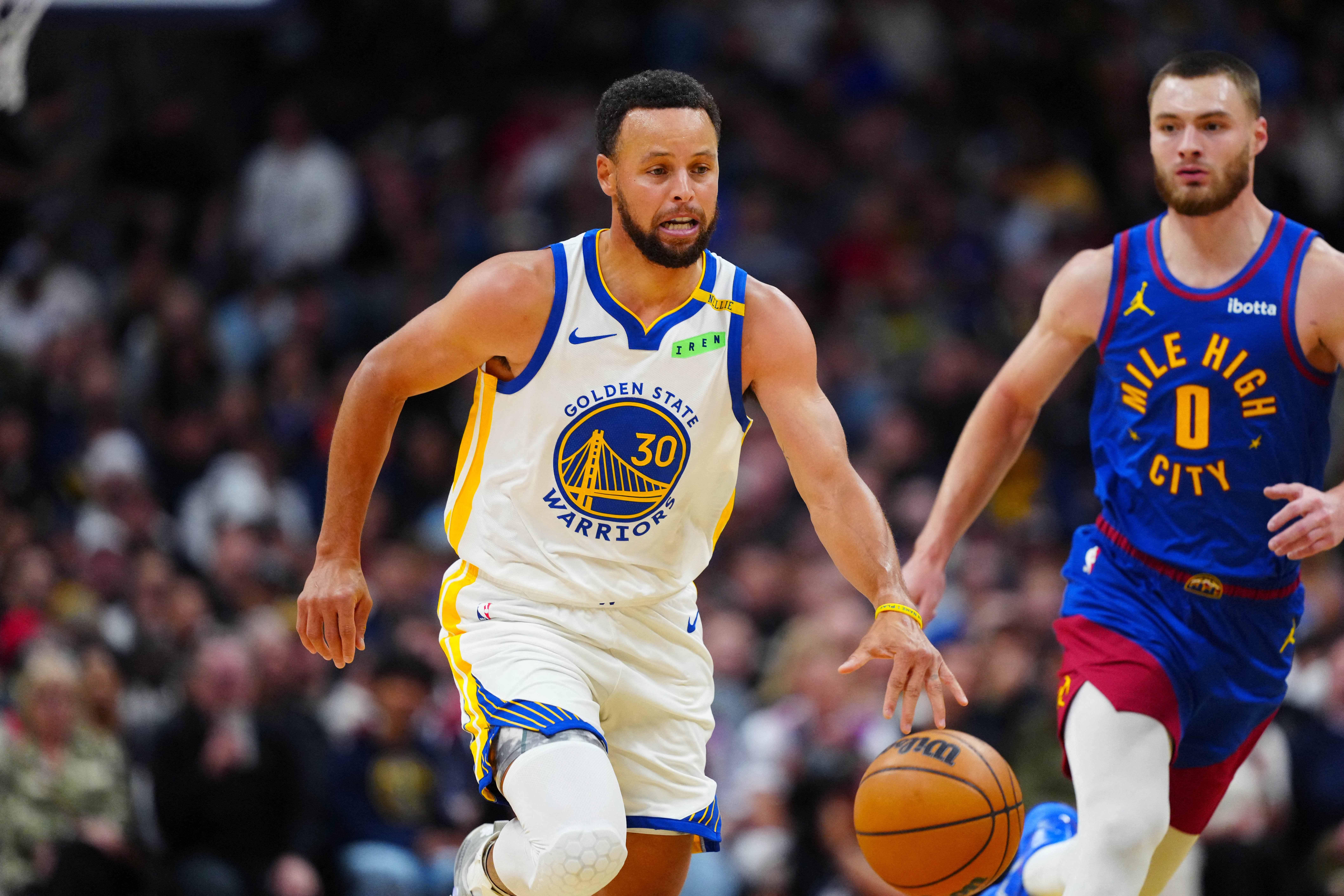 NBA: Stephen Curry's perfect shooting night lifts Warriors over Nuggets