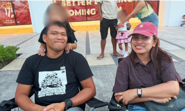 Audi Johnson and his family set up chairs while waiting for the start of MassKara's electric float parade on Oct. 16, 2026 in Megaworld's The Upper East. The start of the parade began in Megaworld's Upper East. 