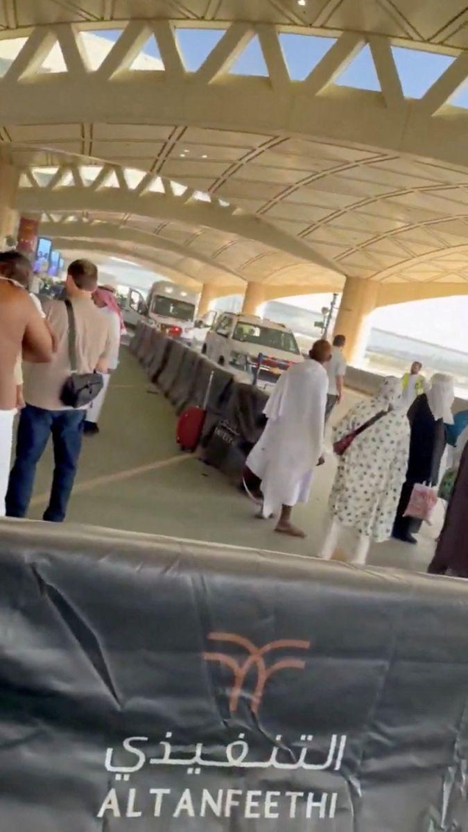 An ambulance is parked outside King Khalid International Airport